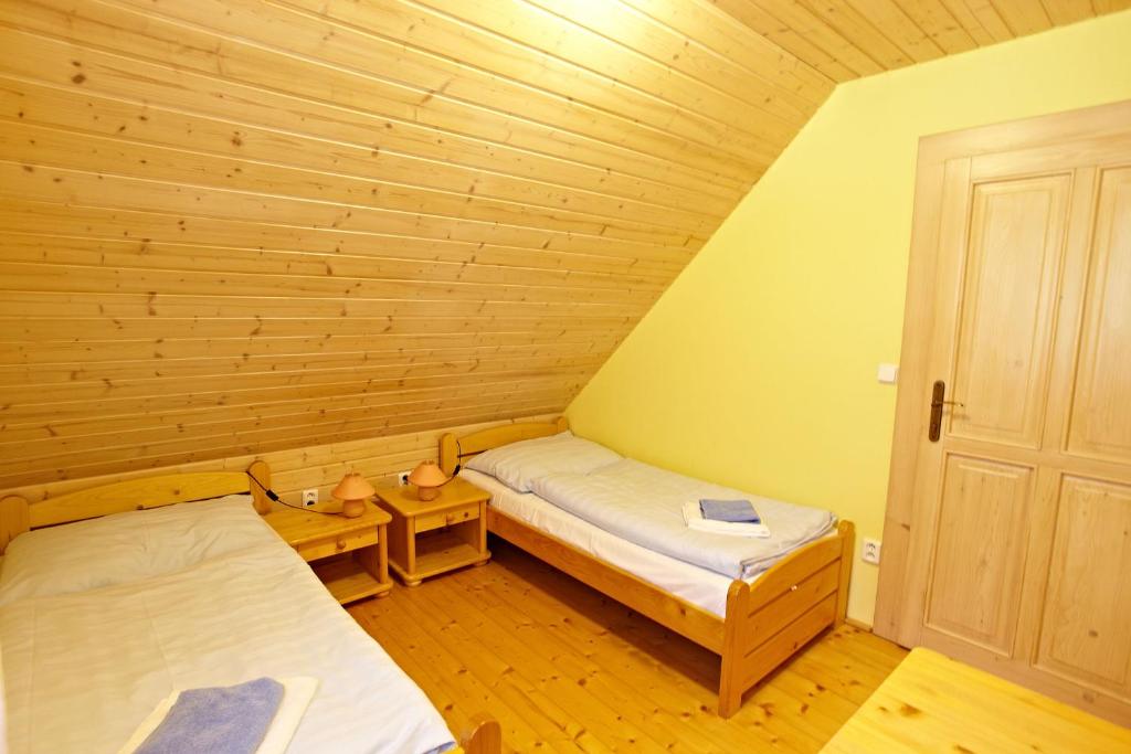 Postel nebo postele na pokoji v ubytování Valašský Šalet
