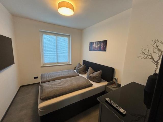 Postel nebo postele na pokoji v ubytování Ferienhaus Deluxe
