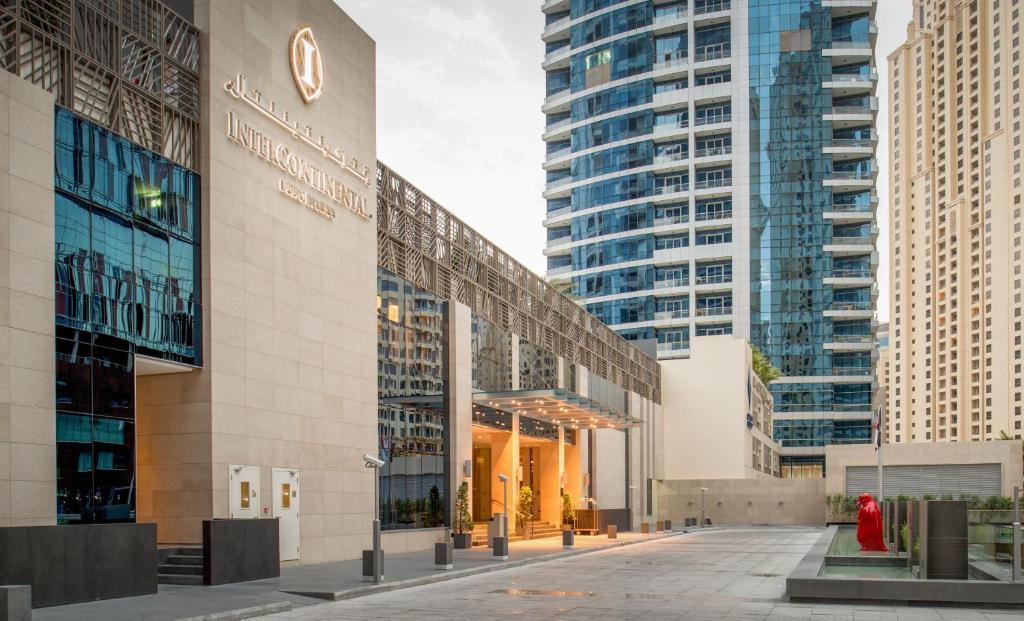a view of a building with tall buildings at InterContinental Dubai Marina by IHG in Dubai