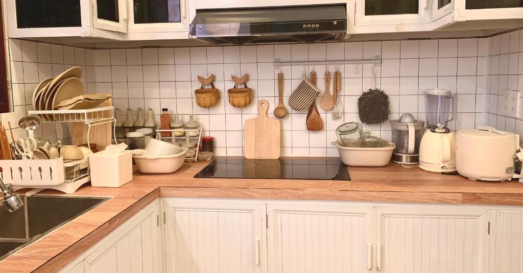 Kuchyň nebo kuchyňský kout v ubytování Glory Hue Homestay