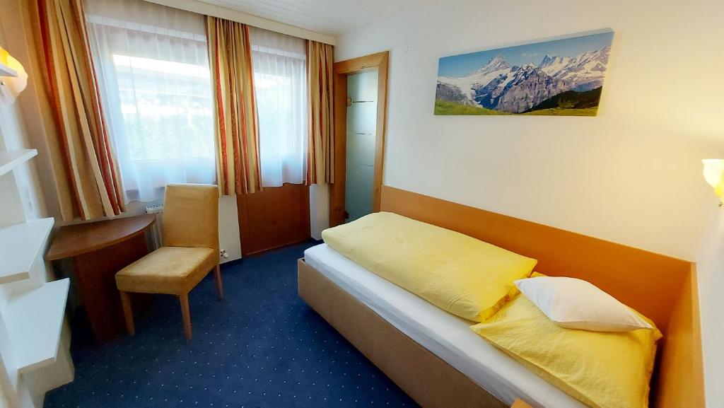 Postel nebo postele na pokoji v ubytování Zeitlos Apartments