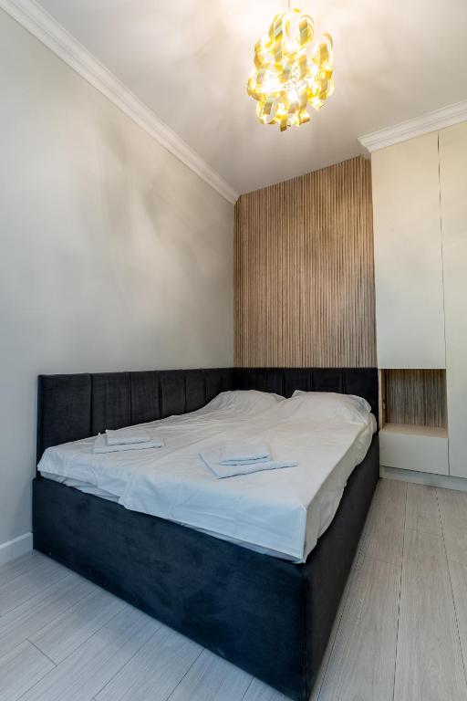 Postel nebo postele na pokoji v ubytování Vitoshka Luxury 2-BR Retreat