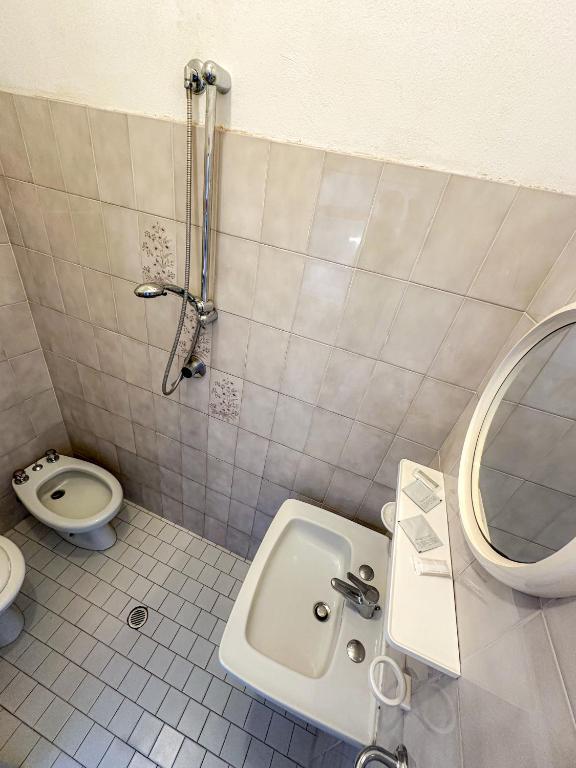 Koupelna v ubytování Hotel Serafini