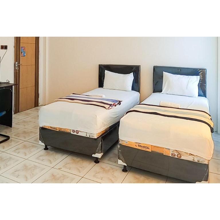 RedDoorz near Grand Tarakan Mall - Стандартный номер Твин