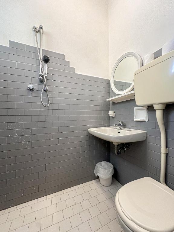 Koupelna v ubytování Hotel Serafini
