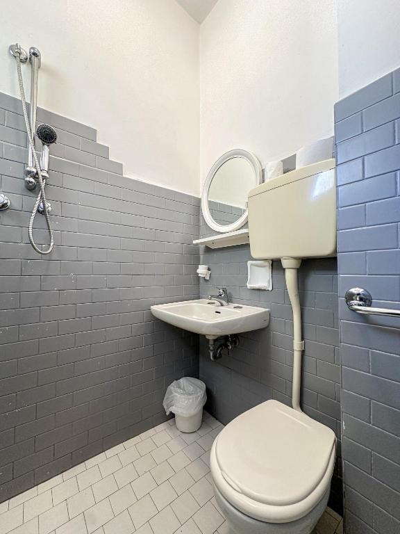Koupelna v ubytování Hotel Serafini