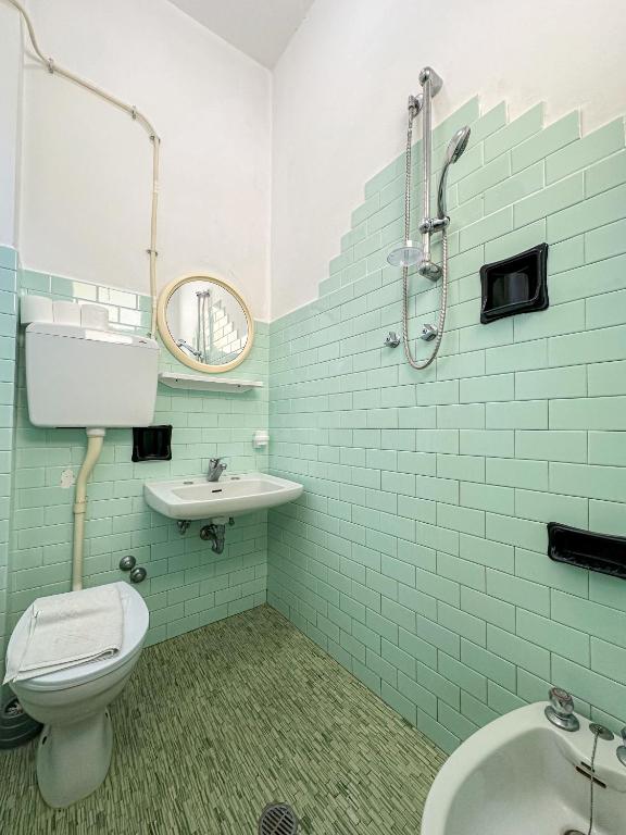 Koupelna v ubytování Hotel Serafini