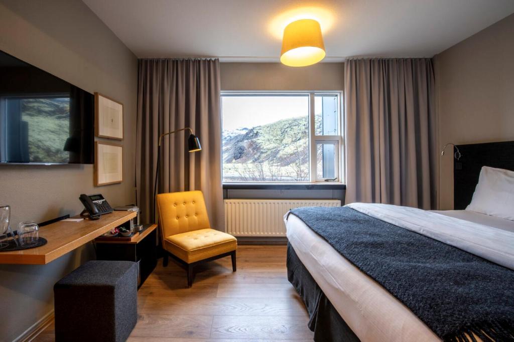 Rúm í herbergi á ION Adventure Hotel, Nesjavellir, a Member of Design Hotels