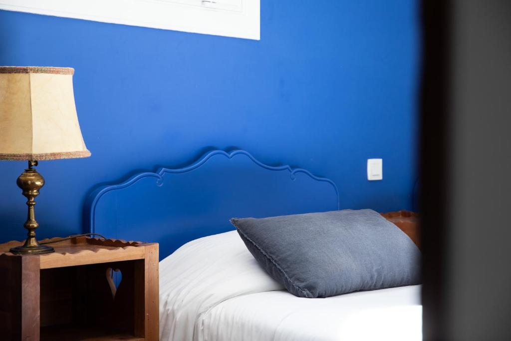 Postel nebo postele na pokoji v ubytování Oustau Camarguen Hôtel & Spa