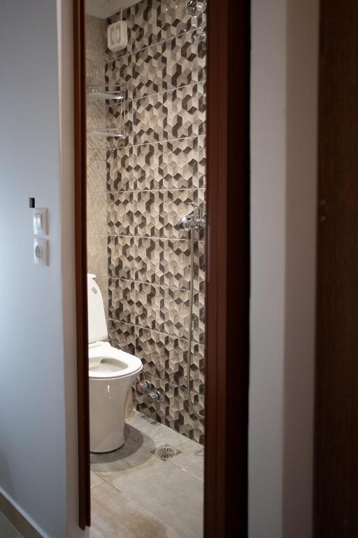 Koupelna v ubytování Star Sianna Village Rooms to let