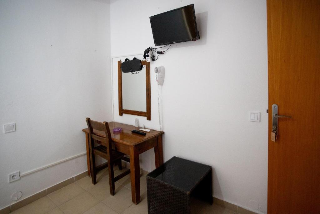 TV a/nebo společenská místnost v ubytování Star Sianna Village Rooms to let