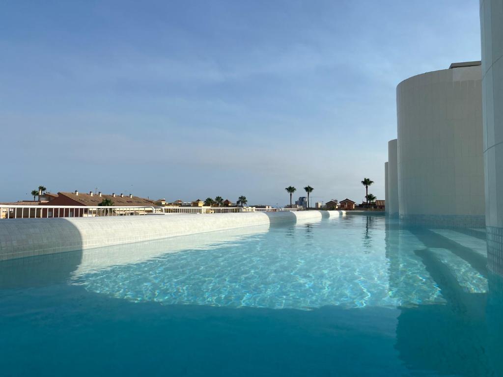 Πισίνα στο ή κοντά στο Travel Habitat Playa Puzol con encanto