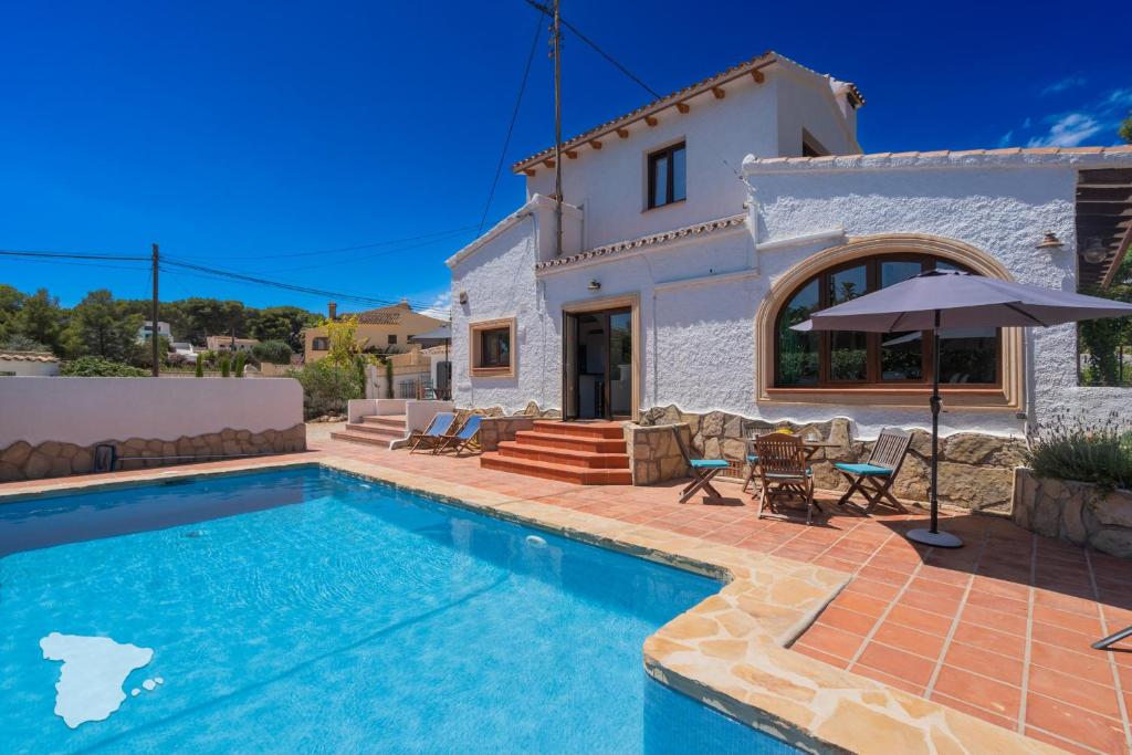 Swimmingpoolen hos eller tæt på Villa Safari