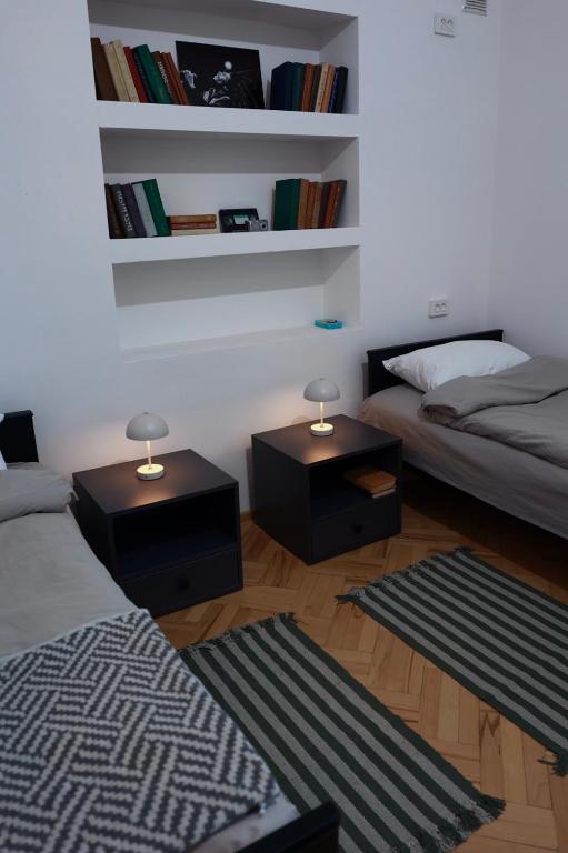 Postel nebo postele na pokoji v ubytování Twins Guest House