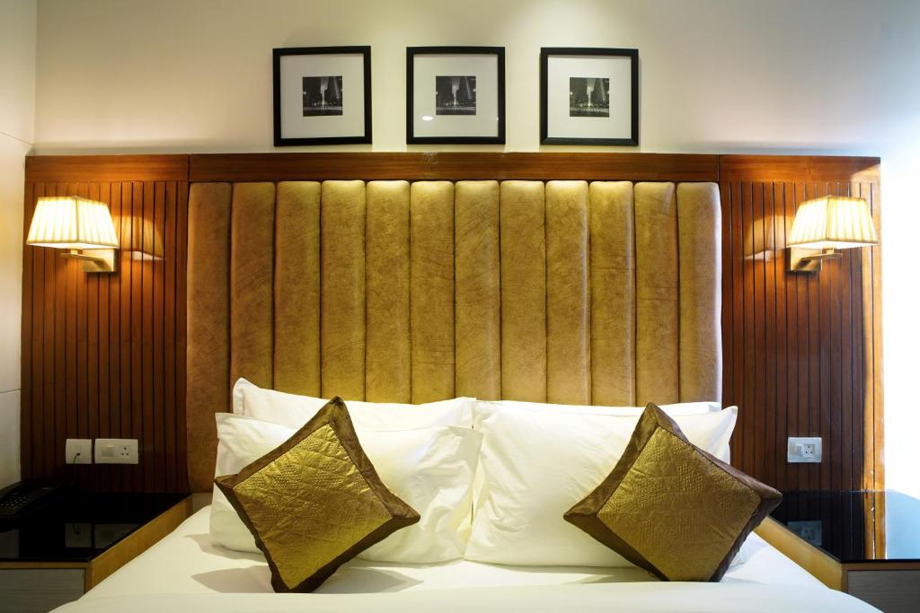 Postel nebo postele na pokoji v ubytování Hotel Sakura Gold