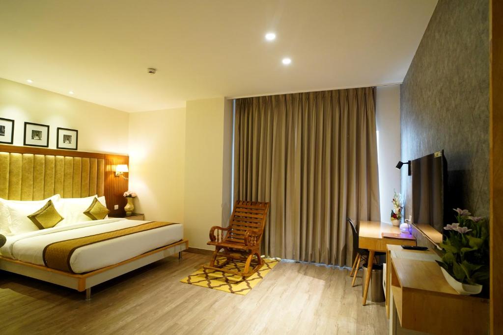 Postel nebo postele na pokoji v ubytování Hotel Sakura Gold