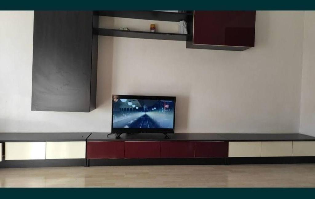 Un televizor și/sau centru de divertisment la Apartament Central 2