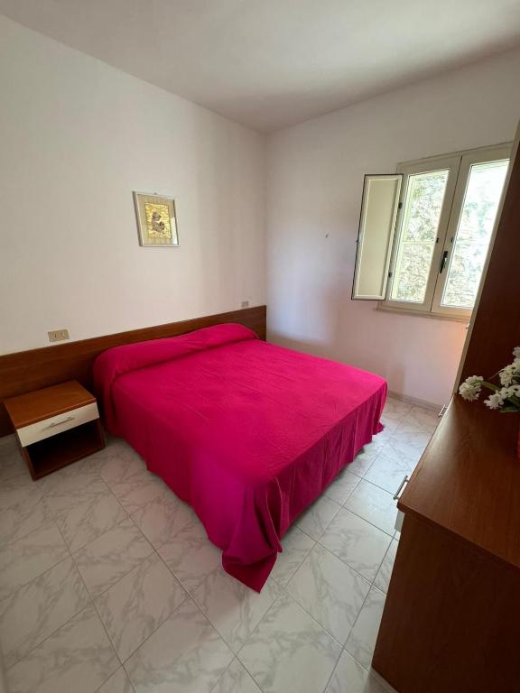 Postel nebo postele na pokoji v ubytování Dimora Flaminio