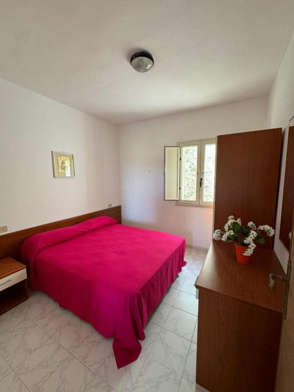 Postel nebo postele na pokoji v ubytování Dimora Flaminio