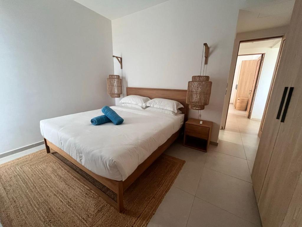 Postel nebo postele na pokoji v ubytování Beachfront Apartment Ocean Point
