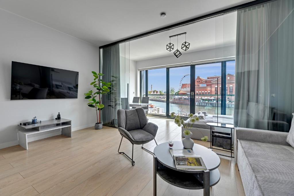 Posedenie v ubytovaní Symfonia Amazing River View Apartment by Downtown Apartments