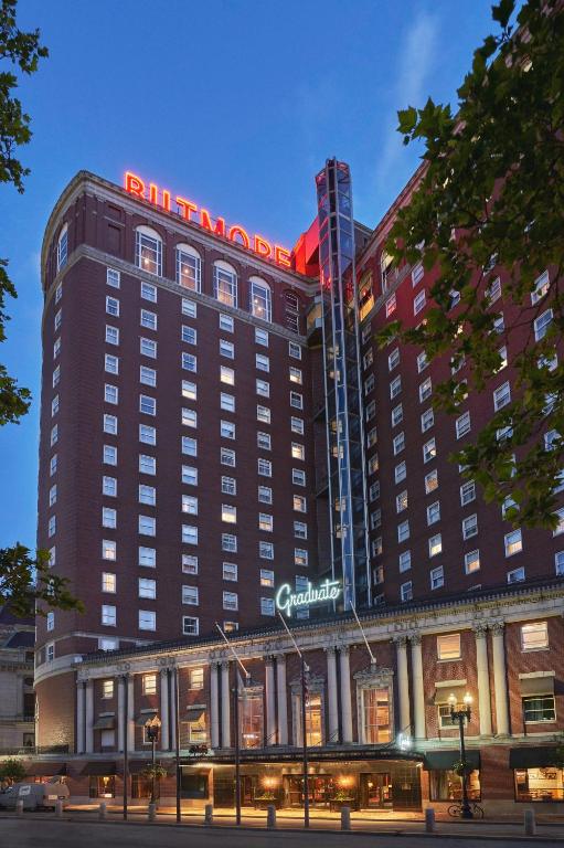 a hotel building with a sign on top of it at Graduate by Hilton Providence in Providence