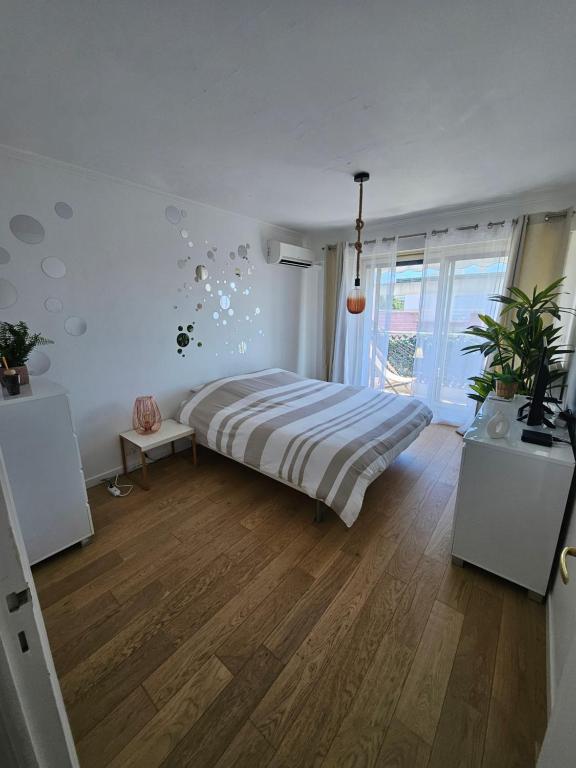 Postel nebo postele na pokoji v ubytování Le Duplex