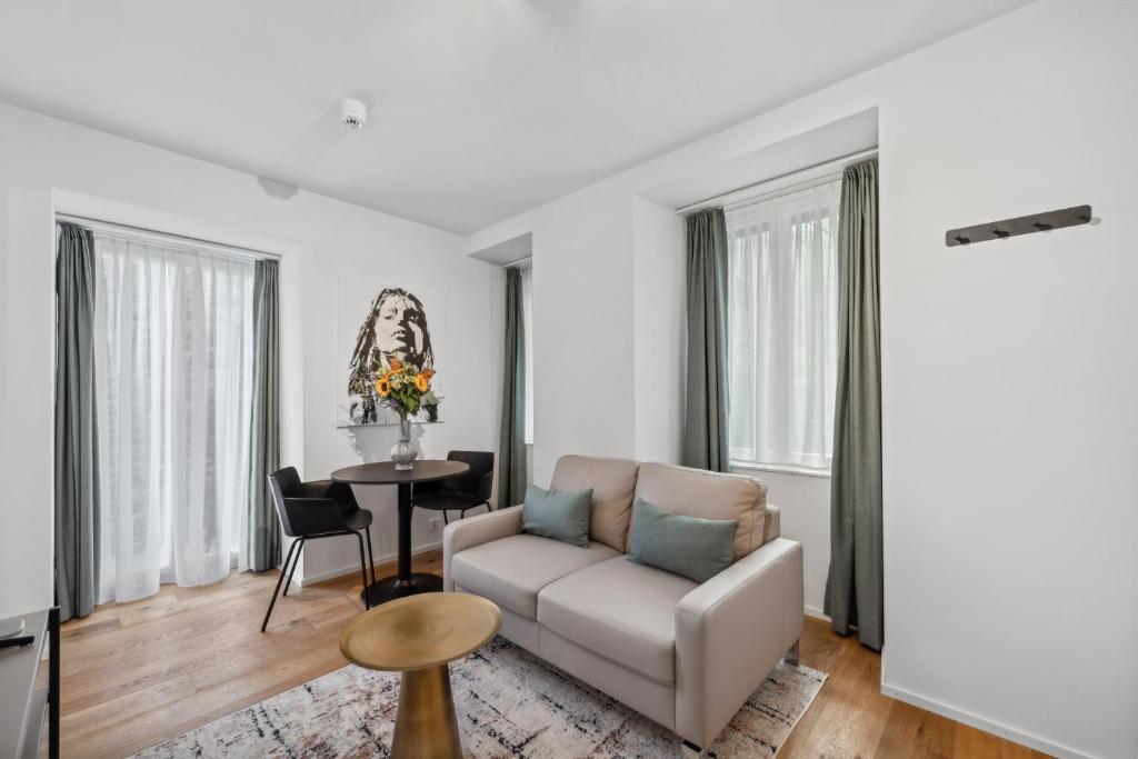 Posezení v ubytování GLANDON Rooms Haldenhof - Self-Check-In