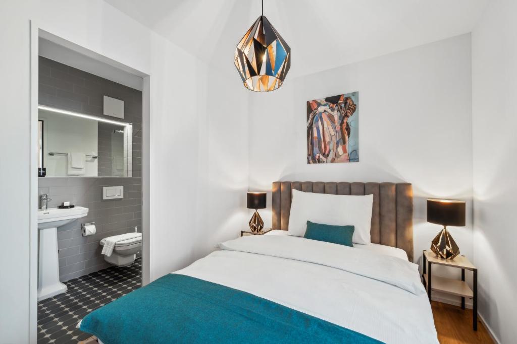 Postel nebo postele na pokoji v ubytování GLANDON Rooms Haldenhof - Self-Check-In