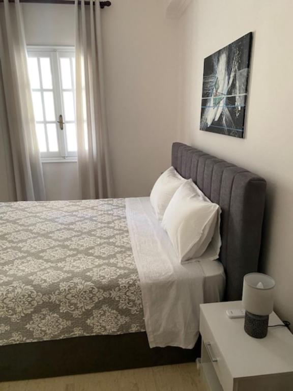 Postel nebo postele na pokoji v ubytování Zante Sunset House