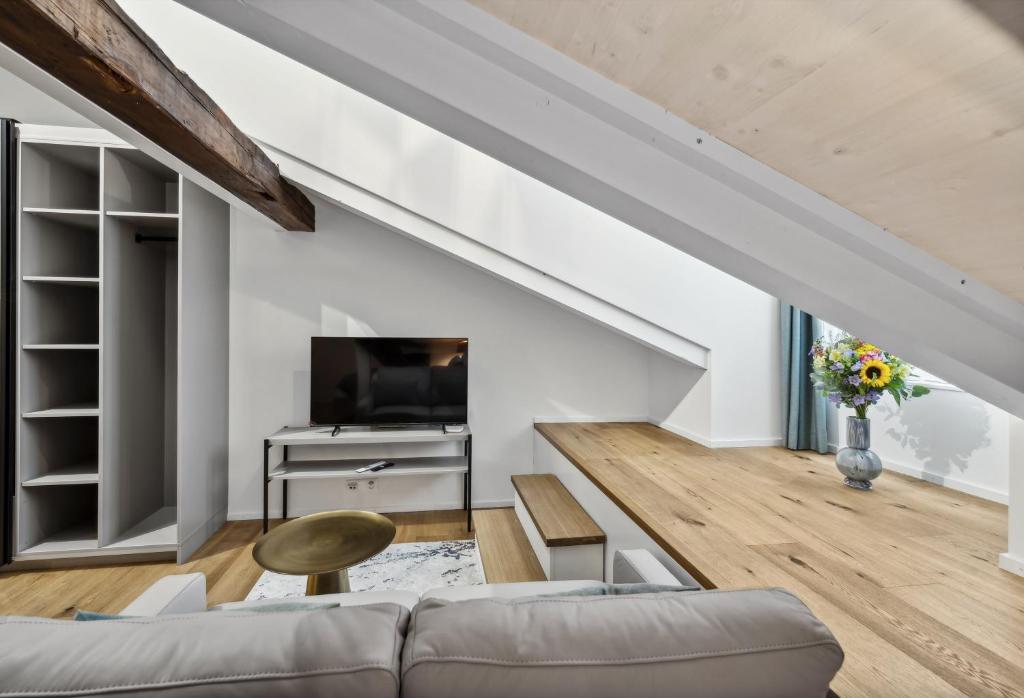 TV a/nebo společenská místnost v ubytování GLANDON Rooms Haldenhof - Self-Check-In