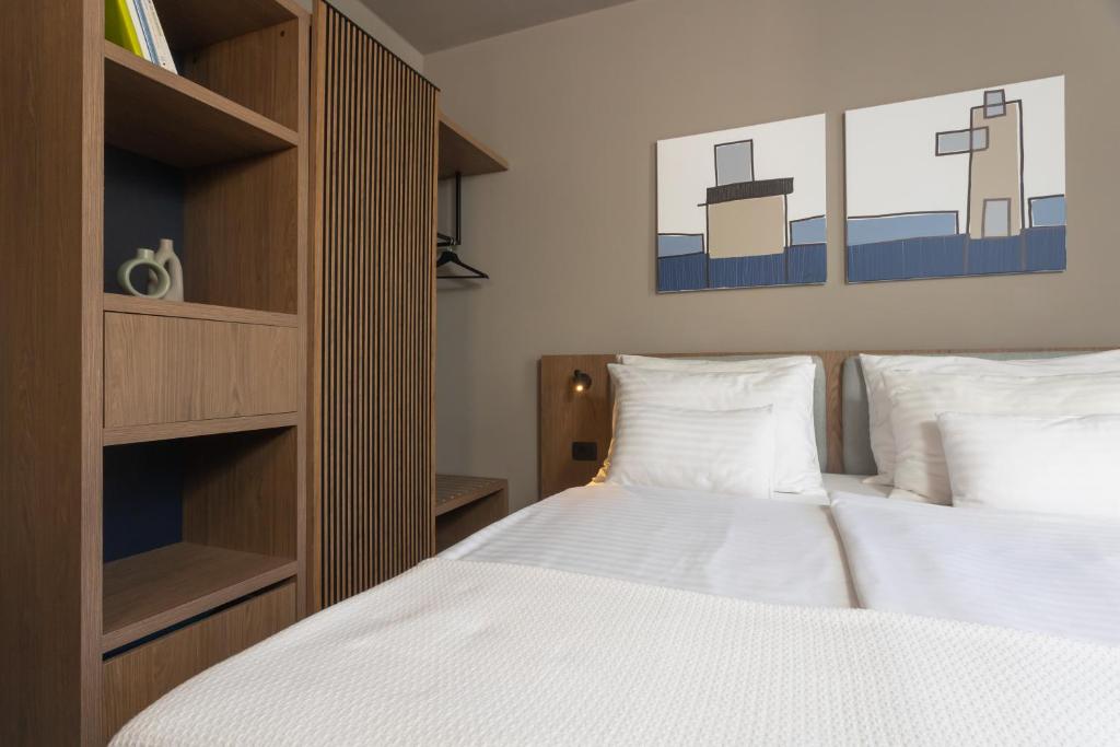 Postel nebo postele na pokoji v ubytování Family Hotel Adria - All inclusive