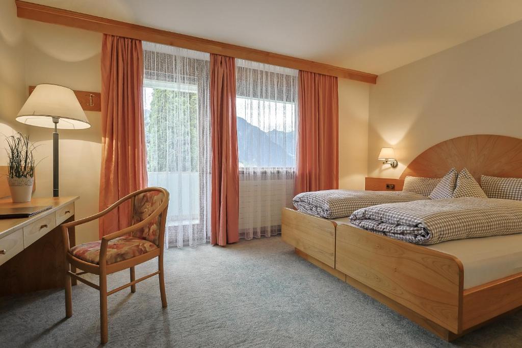 Postel nebo postele na pokoji v ubytování B&B Villa Pattis