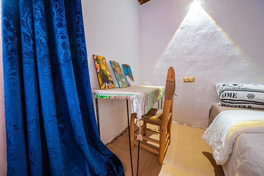 Postel nebo postele na pokoji v ubytování Riad Mtamer, Tetouan