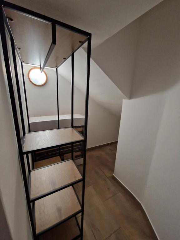 Postel nebo postele na pokoji v ubytování Apartmány Na rychtě