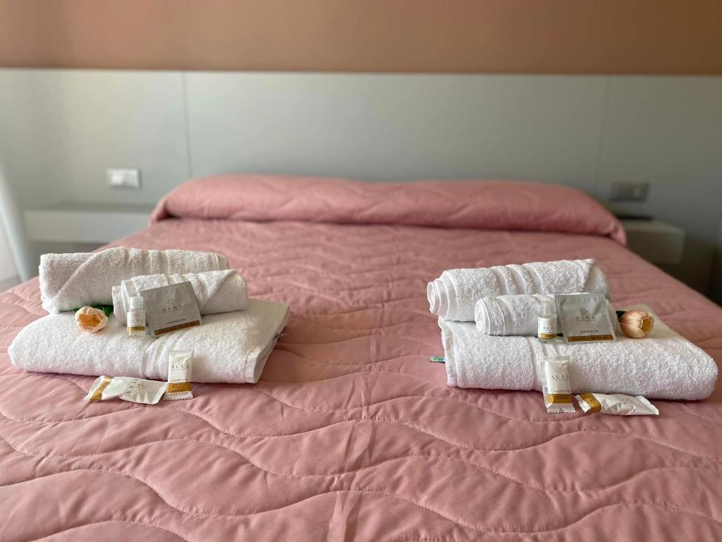 Postel nebo postele na pokoji v ubytování B&B IL Lux