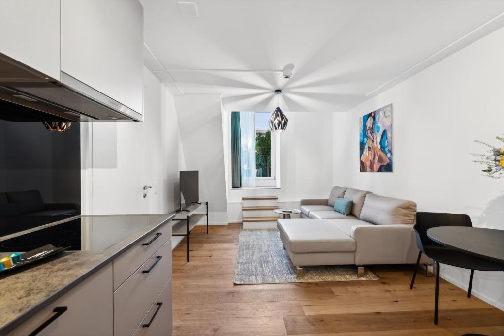 TV a/nebo společenská místnost v ubytování GLANDON Rooms Haldenhof - Self-Check-In