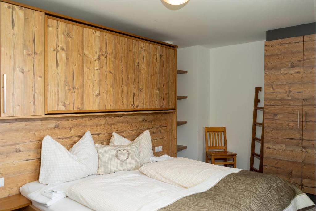Postel nebo postele na pokoji v ubytování Wohnung Kreuzjoch 142- Naviser Huette