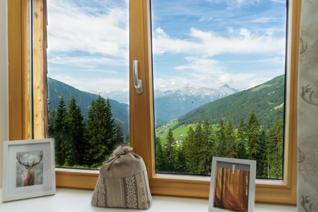Nespecifikovaný výhled na hory nebo výhled na hory při pohledu z apartmánu