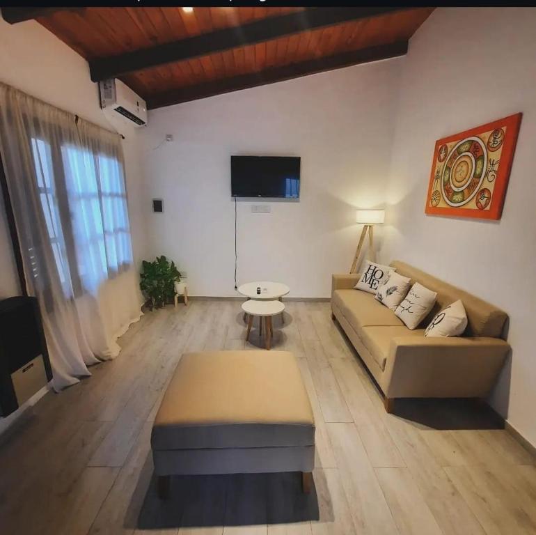 TV a/nebo společenská místnost v ubytování Casa 1136 FIRMAT