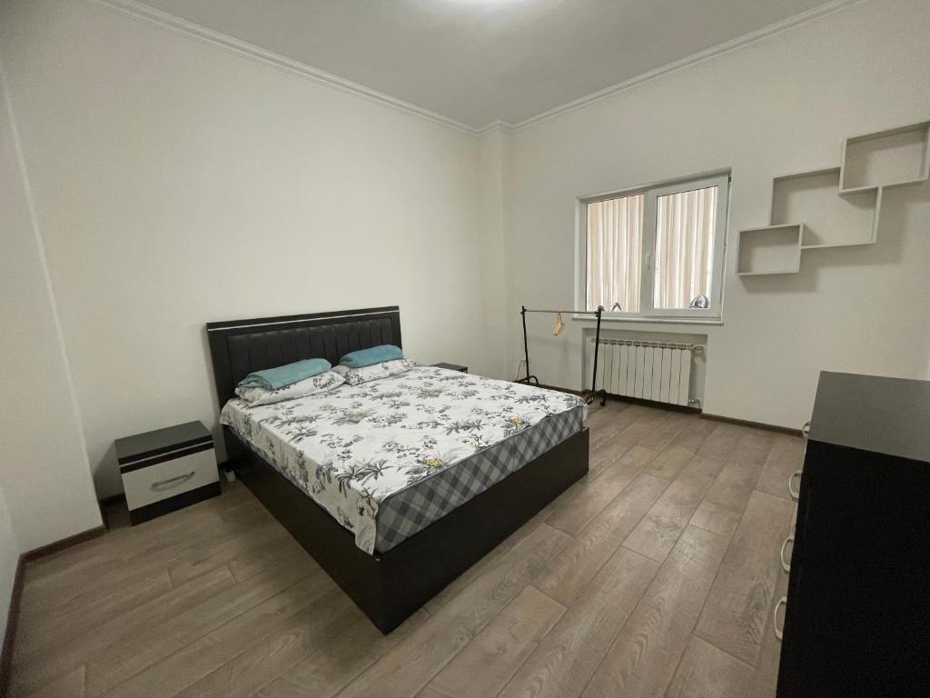 Ένα ή περισσότερα κρεβάτια σε δωμάτιο στο Savannah Pinoy Hostel