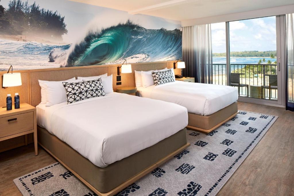Postel nebo postele na pokoji v ubytování The Ritz-Carlton O'ahu, Turtle Bay