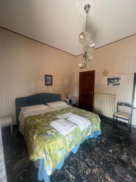 Postel nebo postele na pokoji v ubytování Affittacamere da Elio e Renata