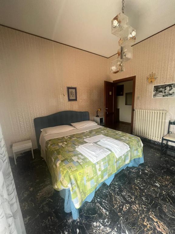 Postel nebo postele na pokoji v ubytování Affittacamere da Elio e Renata