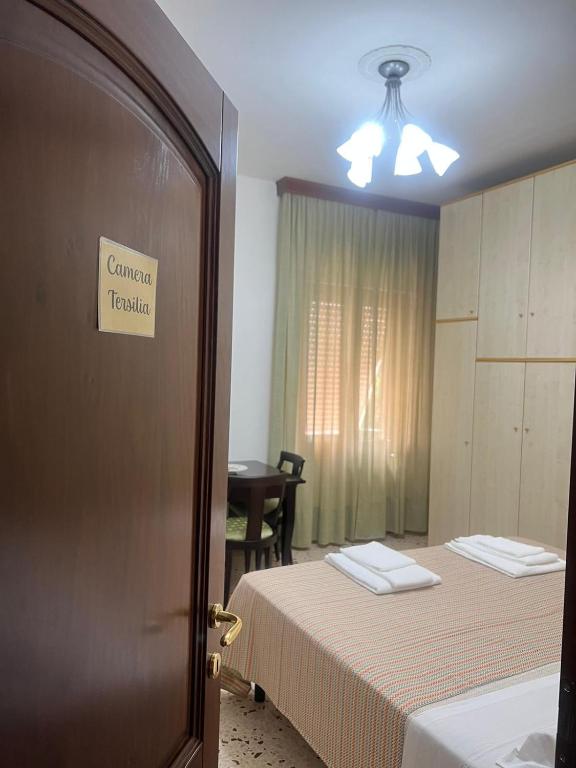 Postel nebo postele na pokoji v ubytování Affittacamere da Elio e Renata