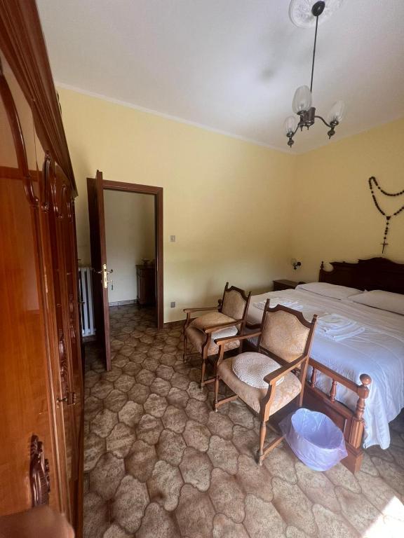 Postel nebo postele na pokoji v ubytování Affittacamere da Elio e Renata