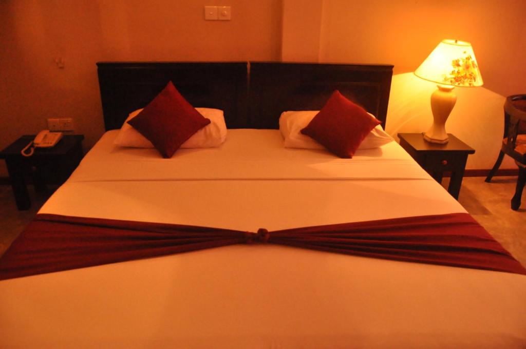 Postel nebo postele na pokoji v ubytování Hotel Silan Mo