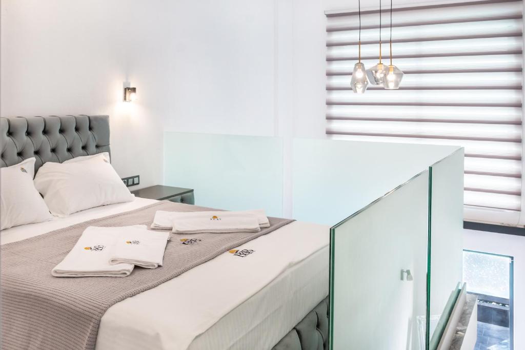 Postel nebo postele na pokoji v ubytování B&B Lofts Thassos
