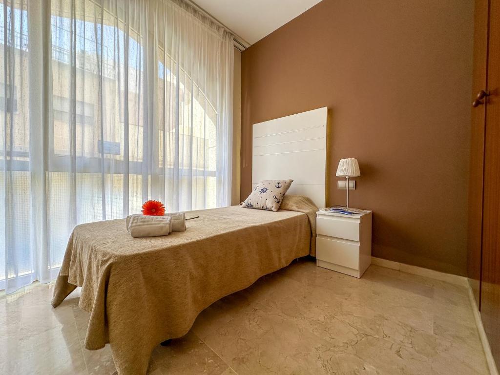 Postel nebo postele na pokoji v ubytování Hotel Alguer