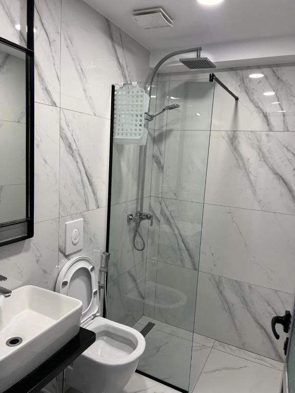 Koupelna v ubytování Dhima Hotel